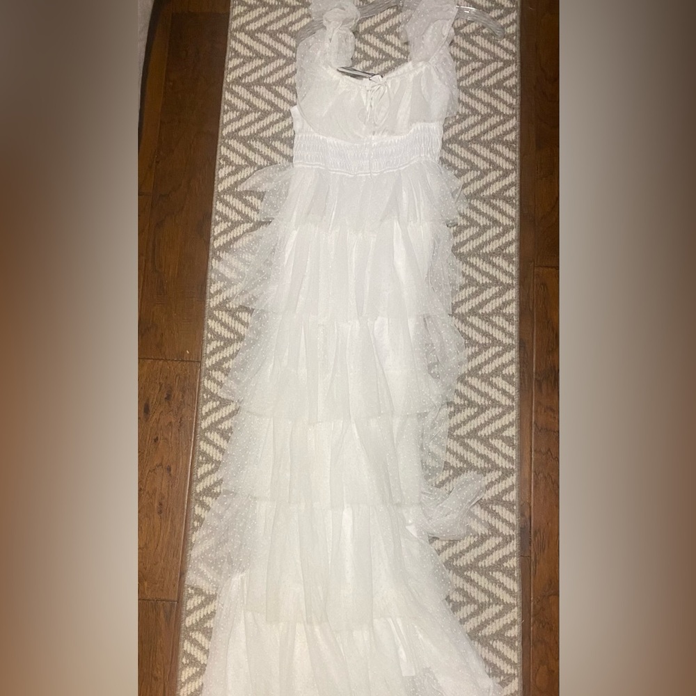 Never worn NWT long tiered gown. From a smoke free home.